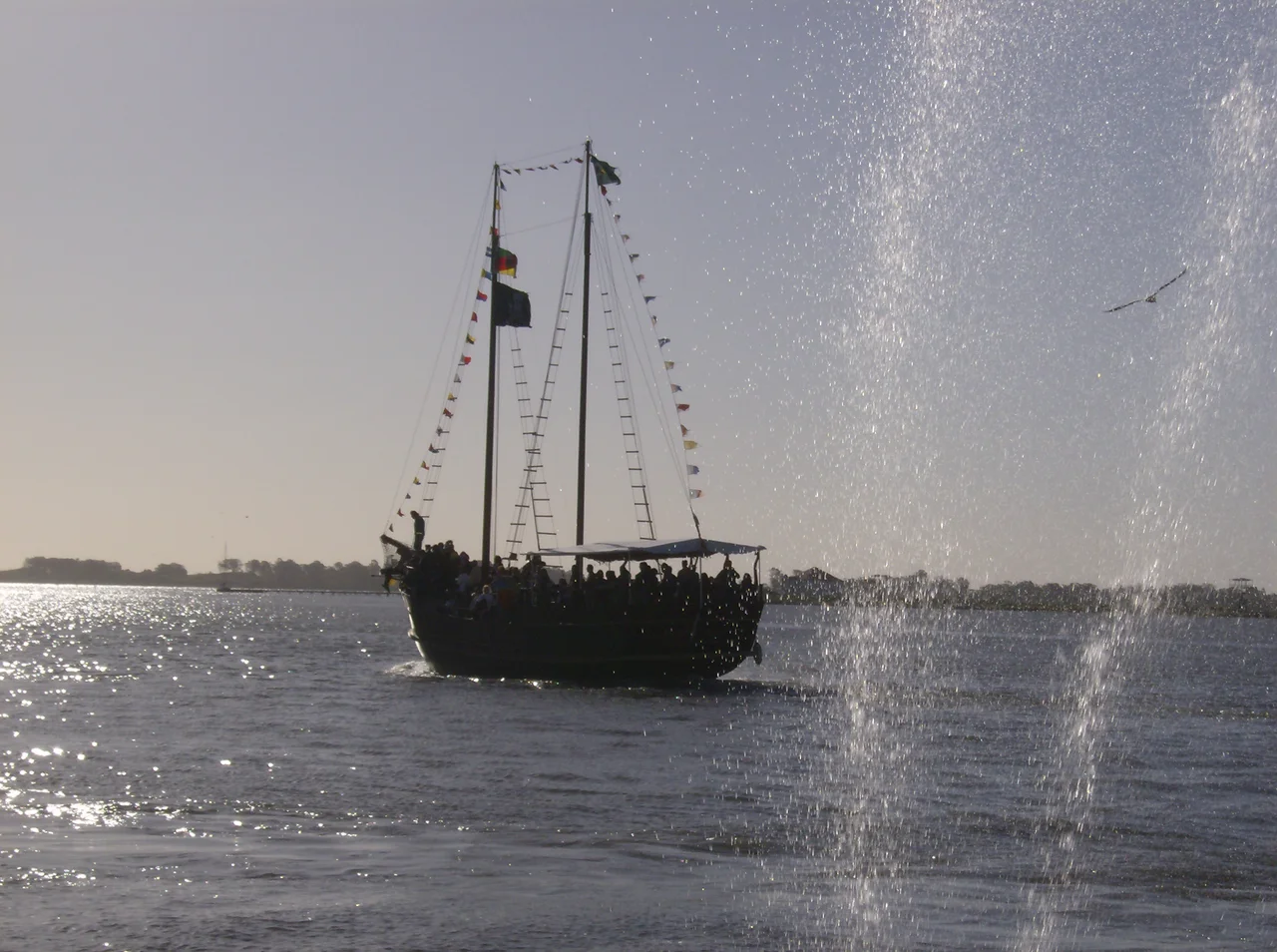 A schooner (named Vento Negro - English: Black Wind) in Lagoa dos Patos (a lagoon near the Atlantic Ocean), in the city of Rio Grande, state of Rio Grande do Sul, Brazil, in a municipal fair named "Festa do Mar" (literally "Party of the Sea").