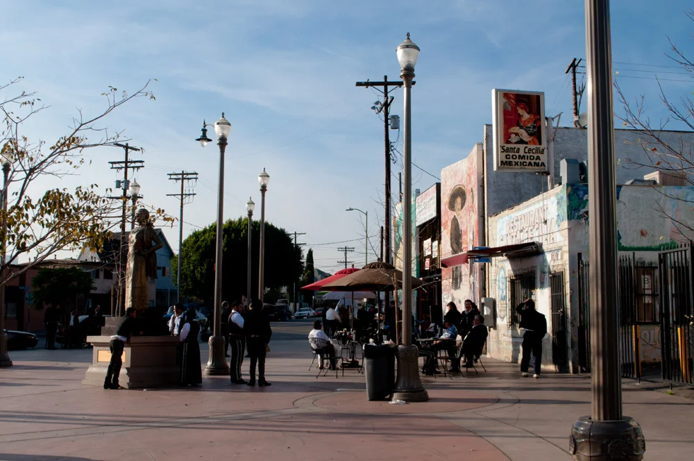 Boyle Heights, where the Mexican influence of East Los Angeles continues to predominate, though there is a bit of Japanese presence from Little Tokyo across the Los Angeles River. Two underground Metro Gold Line stations, Soto and Mariachi Plaza, serve the neighborhood.
Here at Mariachi Plaza, it's all Mexican. In fact, there are several mariachi bands from Michoacan, Mexico, who are available for hire, as seen here.

The statue commemorates Lucha Reyes (1906-1944), a Mexican singer who was best known for singing the Ranchera Song.