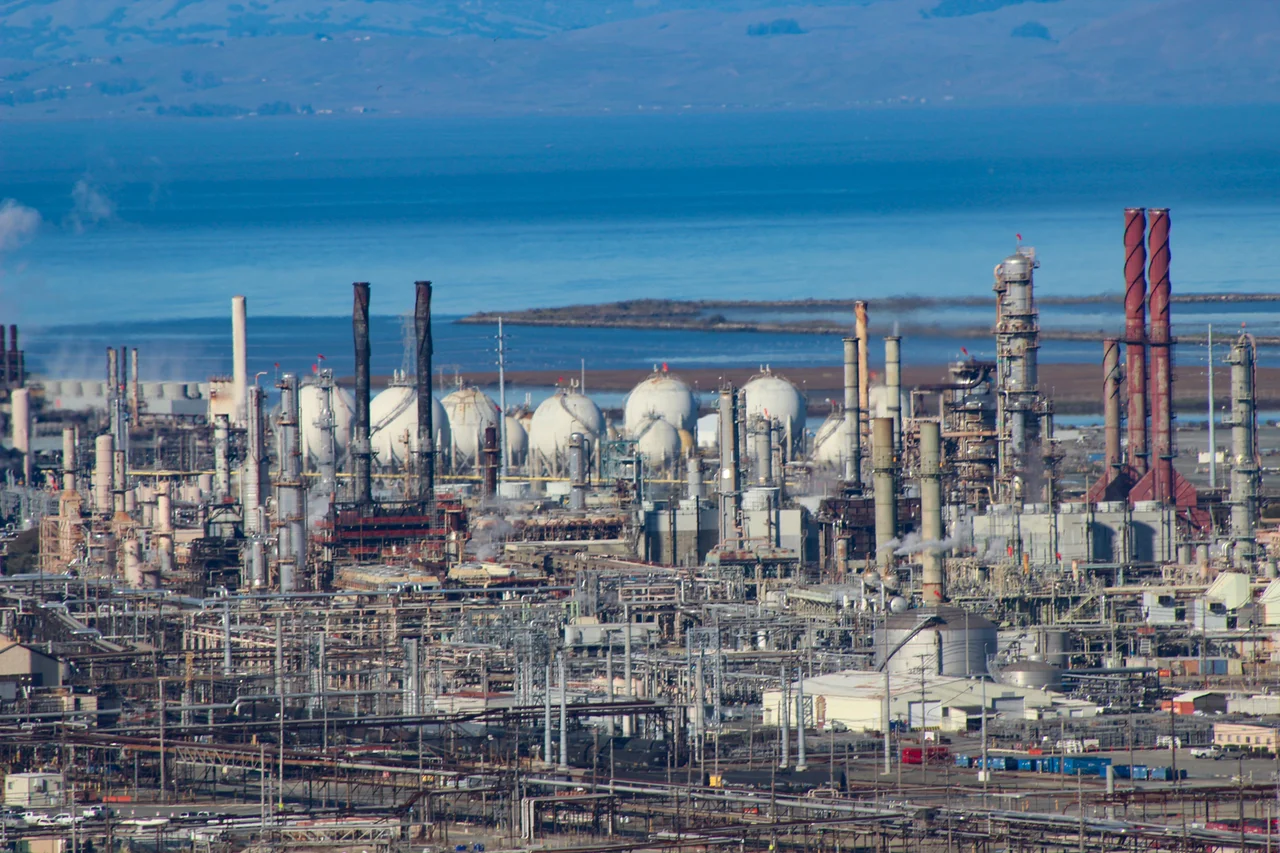 Detail of Chevron Richmond Refinery with backdrop of San Pablo Bay, taken from Nicholl Knob in of Miller/Knox Regional Shoreline Park