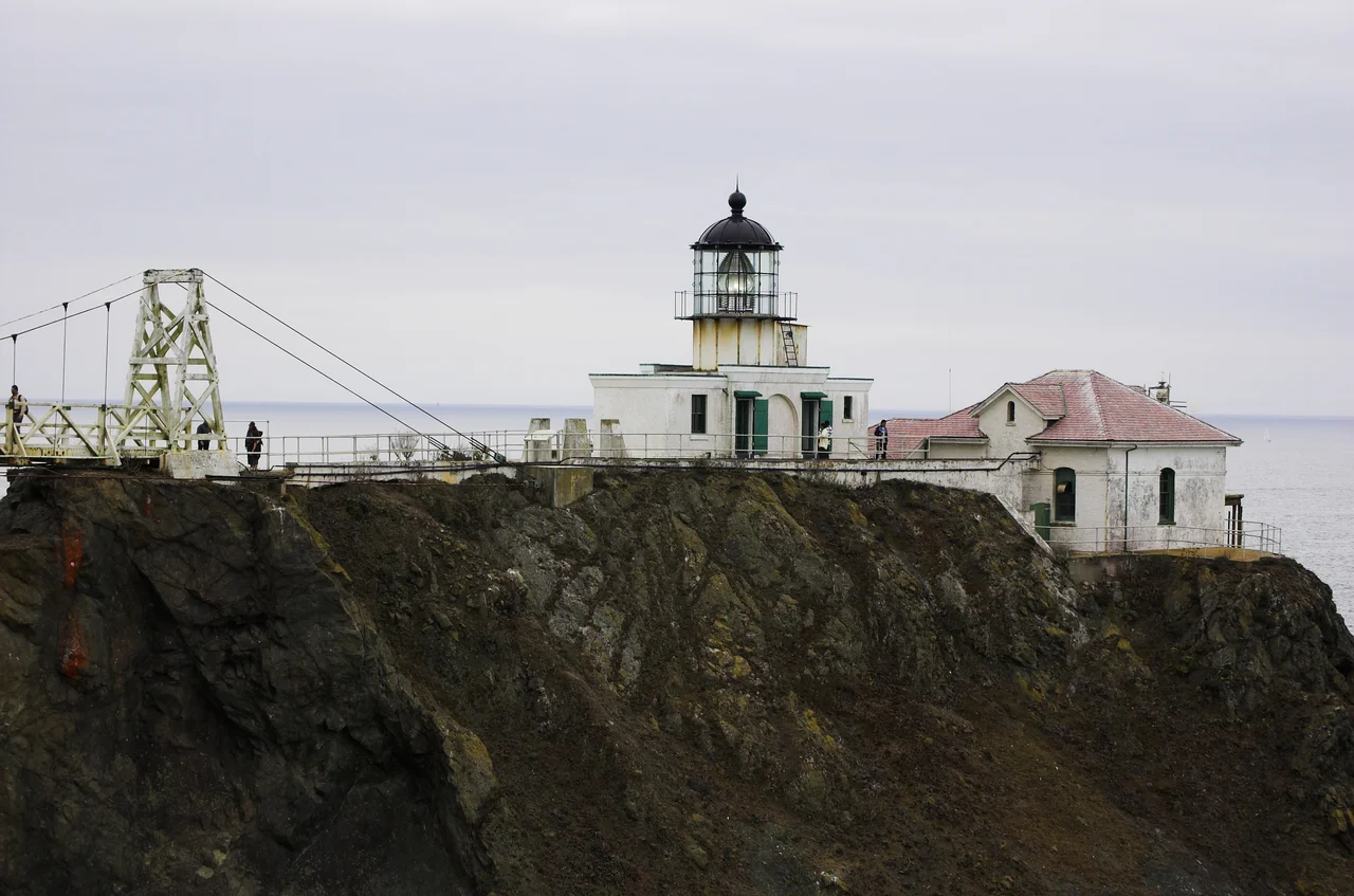 Point Bonita Light. The end of the suspension bridge, which provides access to the lighthouse, is visible on the left side of the photo.
Photo taken by me, Joshua Thompson.