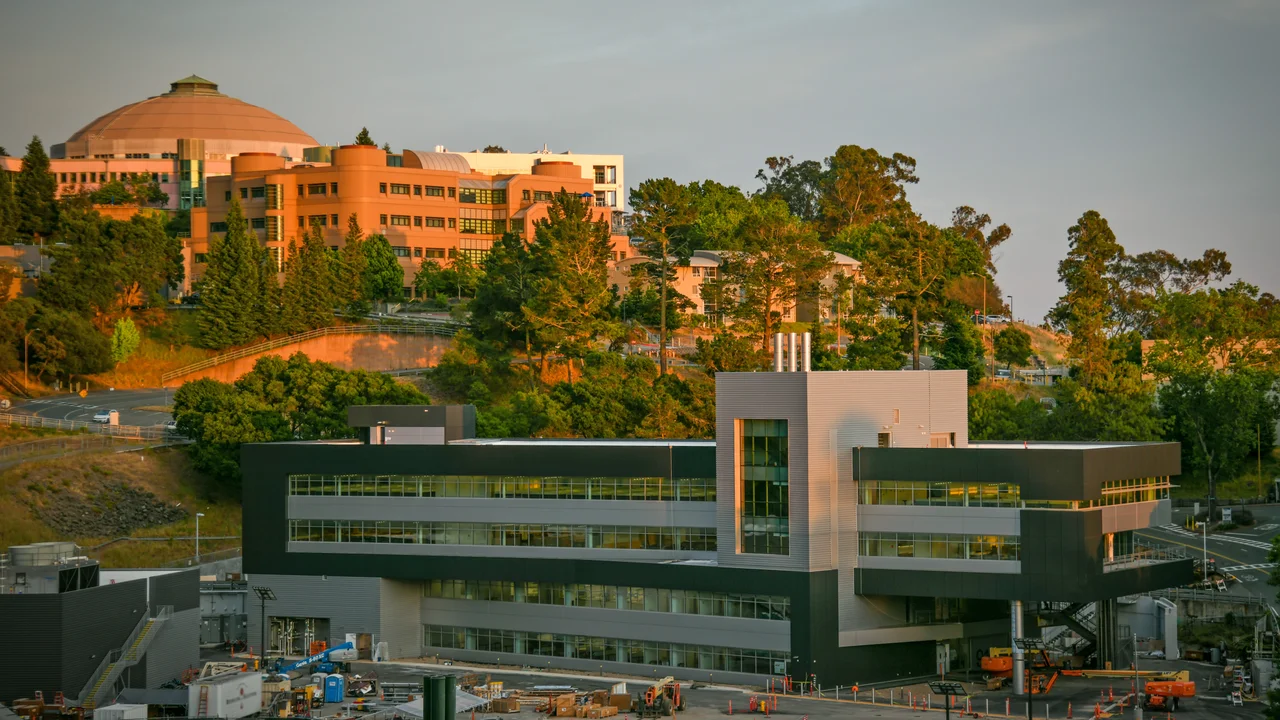 The Integrative Genomics Building (foreground) at Lawrence Berkeley National Laboratory, the home of the DOE Joint Genome Institute (JGI) and the DOE Systems Biology Knowledgebase (KBase). The Advanced Light Source (ALS) looming in the background.