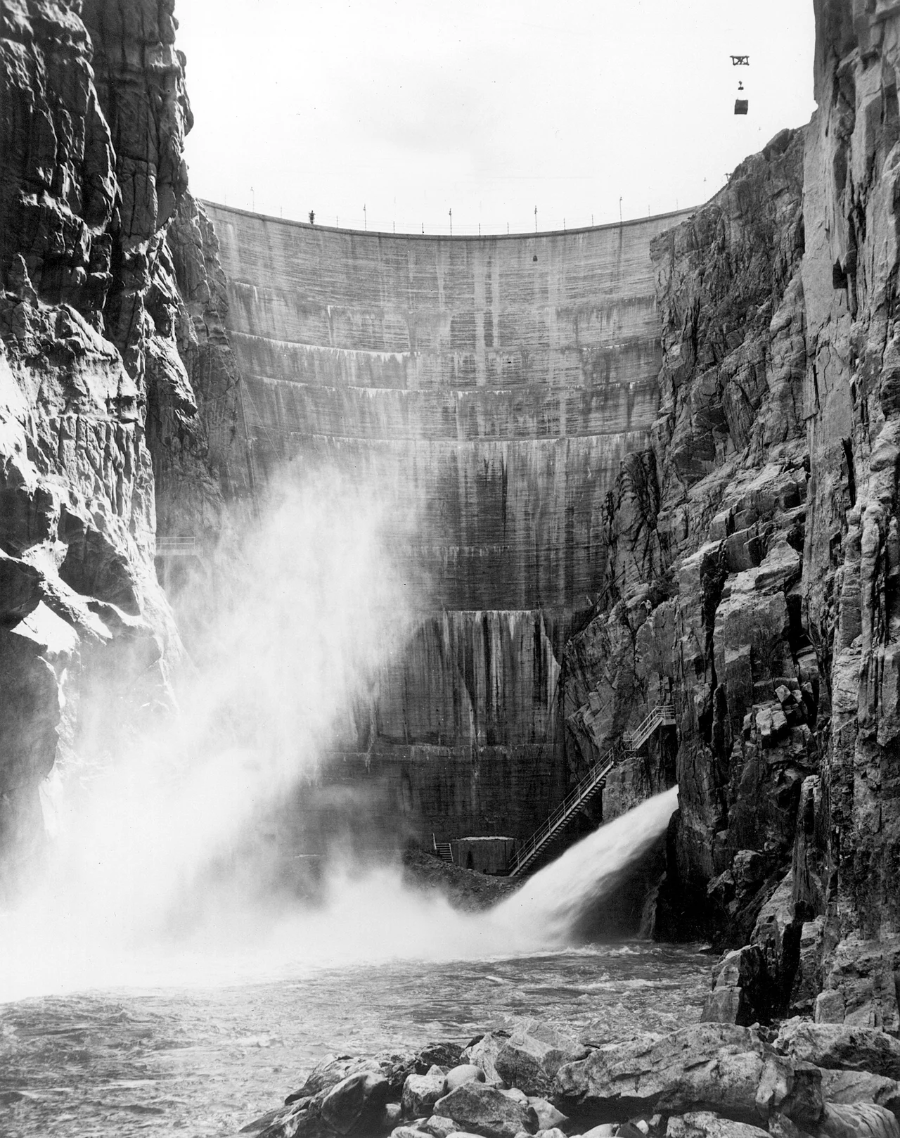 One of the first high concrete dams built by the Bureau of Reclamation is Buffalo Bill Dam on the Shoshone River, about 7 miles west of Cody, Wyoming.