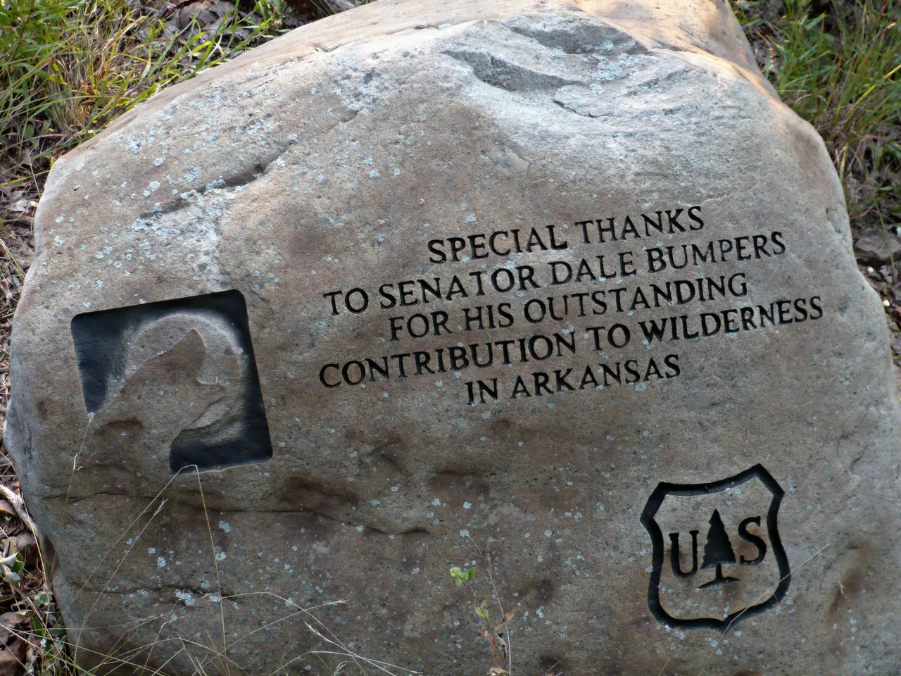 Monument to Dale Bumpers at Flatside Wilderness, Ouachita Mountains, Arkansas. This monument is located just off the forest road parking area slightly west of Flatside Pinnacle in Ouachita National Forest.