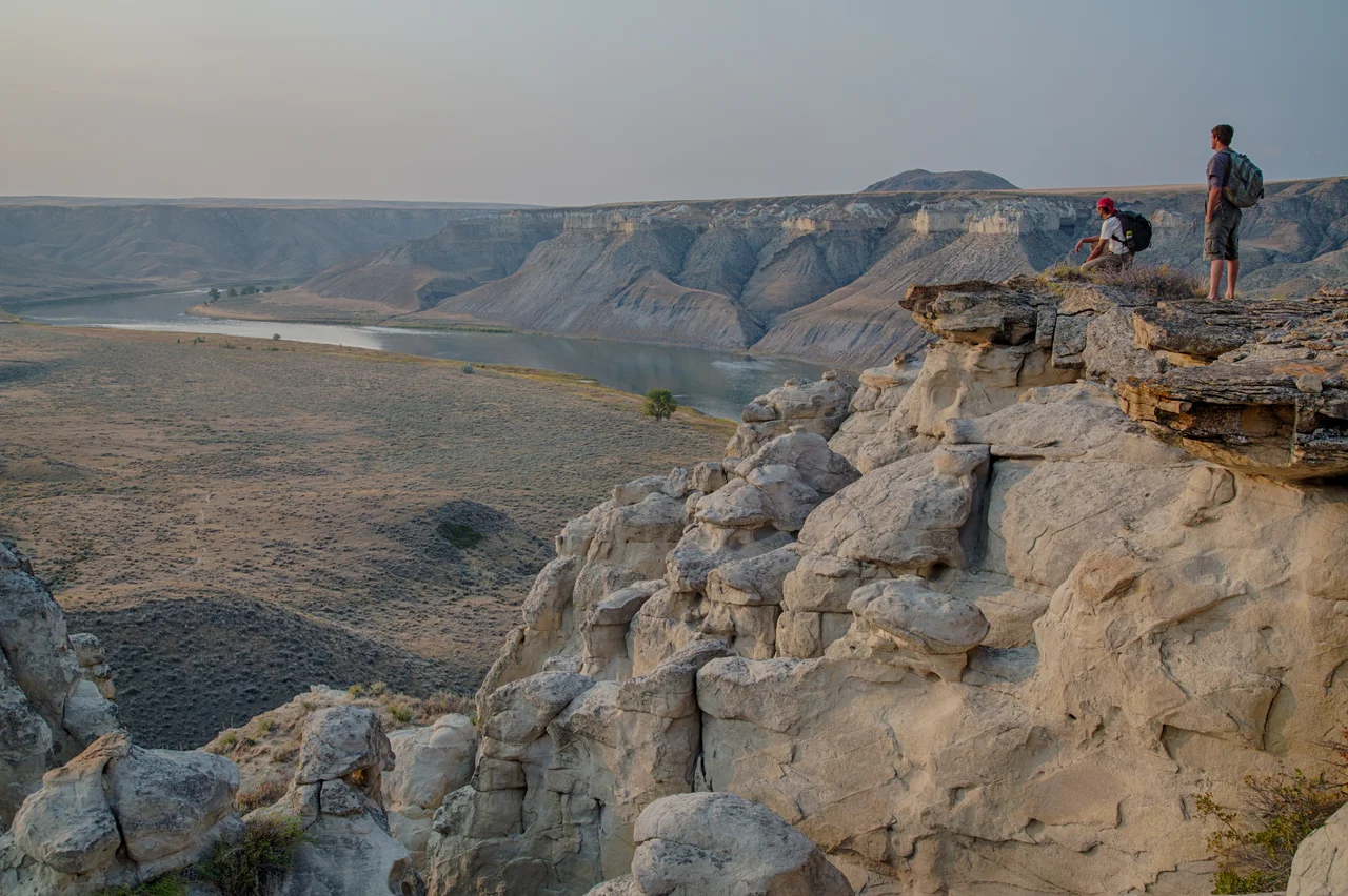 Our July #conservationlands15 Bucket List Location: Take a step back in time and paddle through history along the BLM Upper Missouri Wild and Scenic River in Montana
“The hills and river Clifts which we passed today exhibit a most romantic appearance…. The bluffs of the river rise to hight of from 2 to 300 feet and in most places nearly perpendicular; they are formed of remarkable white sandstone which is sufficiently soft to give way readily to the impression of water…” Meriwether Lewis, May 31, 1805.
You can camp in the same locations as the 1805 Lewis and Clark expedition on your multi-day canoe expedition down the “Big Muddy”. The river is a relatively easy paddle with current and riffles but no major rapids. Along the way, camp under the shade of spreading cottonwoods and try your luck catching a paddlefish – some weigh over 100 pounds. The Breaks Country surrounding the river offers opportunities for scrambles and cross country hikes to the bluffs above.
The unique geology and harsh landscapes that were extensively described by Lewis and Clark are in a condition that has changed little since the passage of the expedition. Historic homesteads dot the river banks, and remnants of the steamboat era remain in inscriptions that were etched on the rock walls.
Photo by Bob Wick, BLM