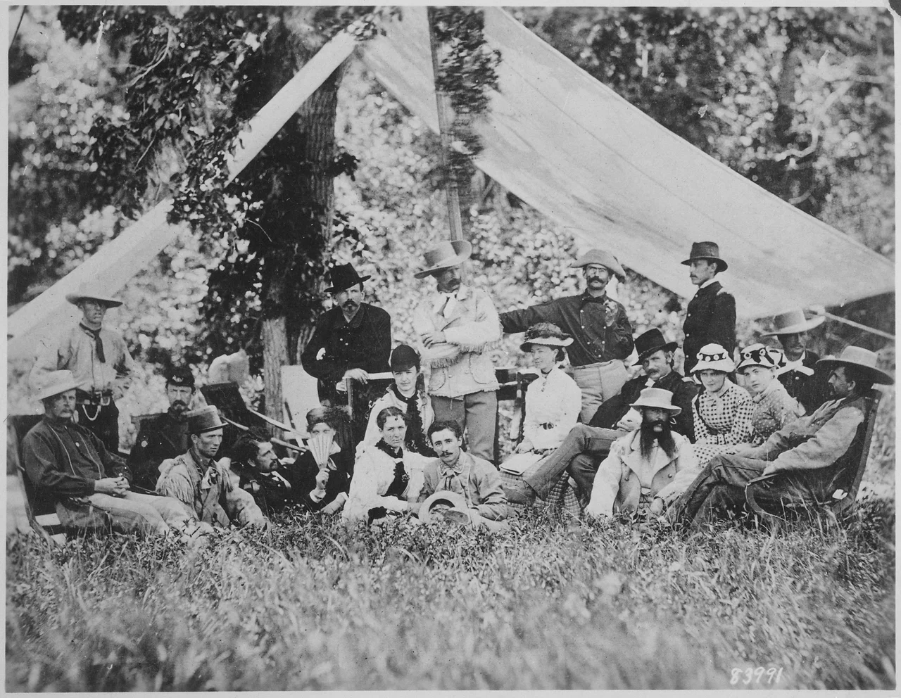 Hunting and camping party of Custer (standing in center) and invited guests. Fort A. Lincoln on the Little Heart River, - NARA - 530885.tif