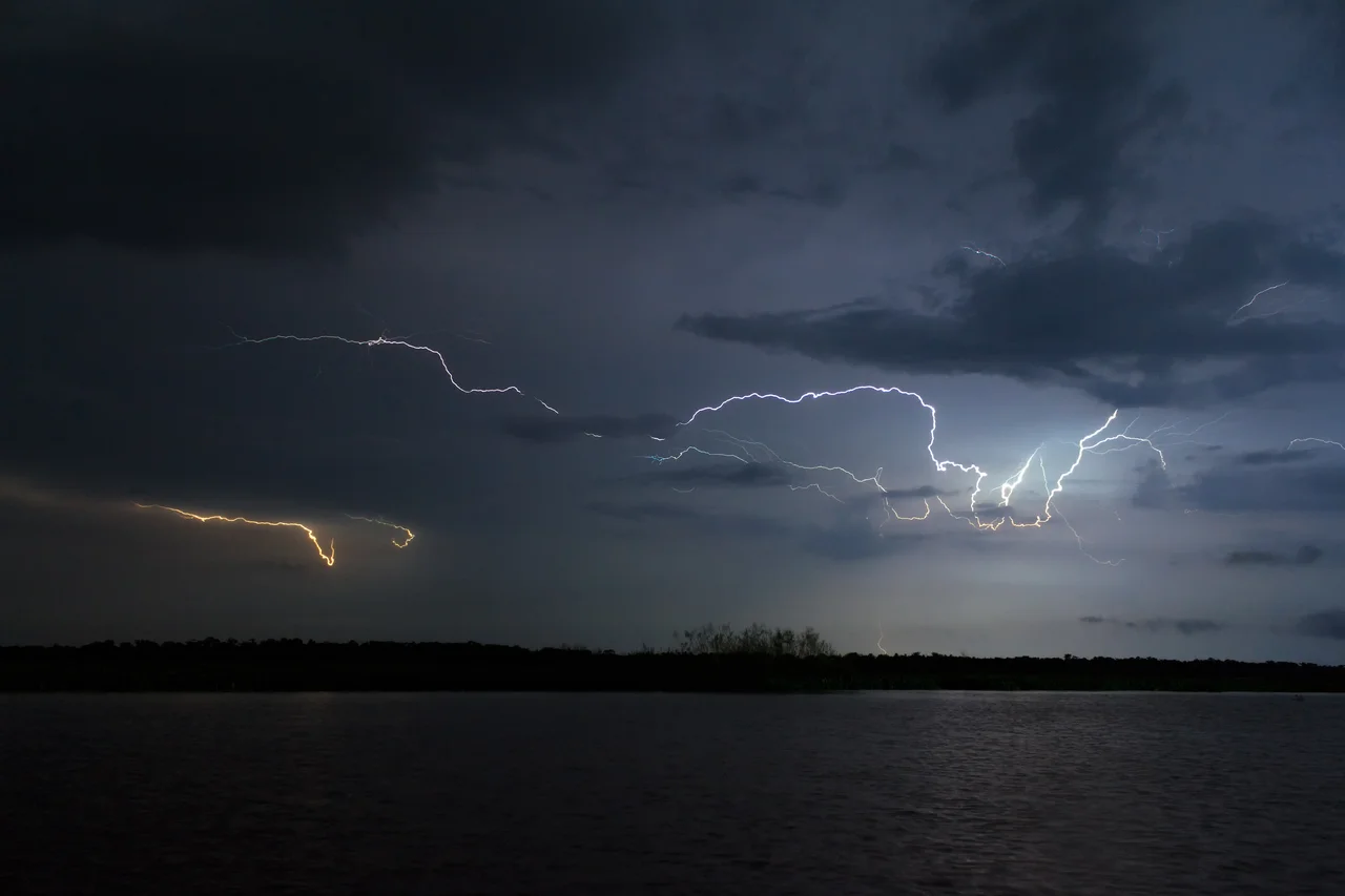 The Catatumbo Lightning is an atmospheric phenomenon in Venezuela. It occurs only over the mouth of the Catatumbo River where it empties into Lake Maracaibo. The frequent, powerful flashes of lightning over this relatively small area are considered to be the world's largest single generator of tropospheric ozone

en.wikipedia.org/wiki/Catatumbo_lightning
