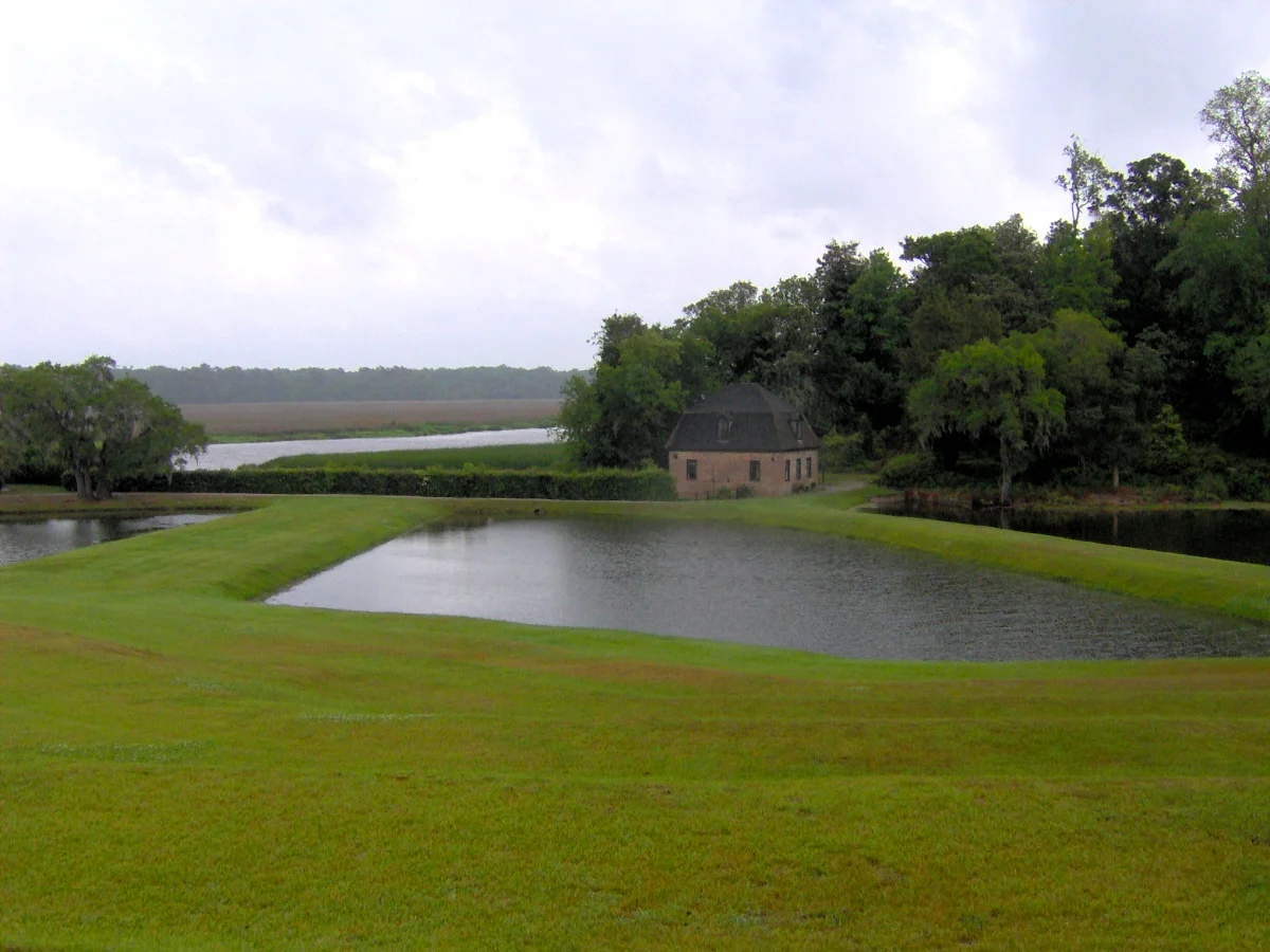 The "Butterfly Lakes" (foreground and left) and the Rice Mill at Middleton Place, near Charleston, South Carolina, USA. The Ashley River is visible in the distance.