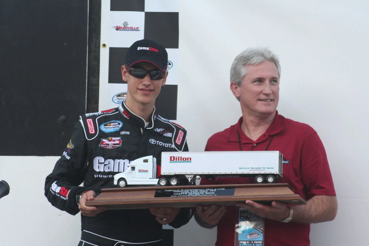 NASCAR driver w:Joey Logano holds his trophy for winning the pole position at Nashville in his second NASCAR Nationwide Series race. Shot by "The Daredevil" at the June 2008 Nashville Nationwide NASCAR event