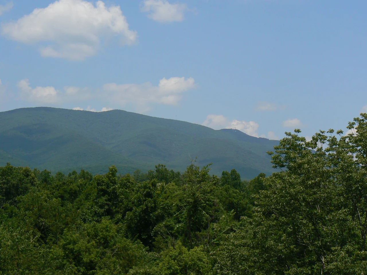 View towards west from Elliott Knob (4,463 feet (1,360 m)), the highest point in Augusta County, Virginia. Approximate coordinates image taken: N38°09′59″, W79°18′53″