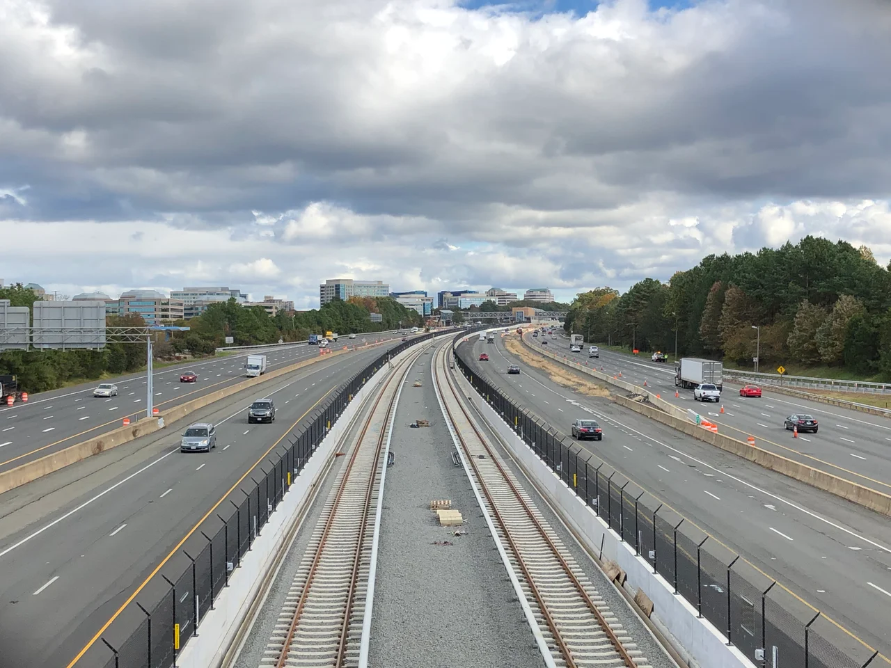 View east along Virginia State Route 267 (Dulles Toll and Access Roads) and the Silver Line of the Washington Metro from the overpass for Virginia State Route 286 (Fairfax County Parkway) in Reston, Fairfax County, Virginia