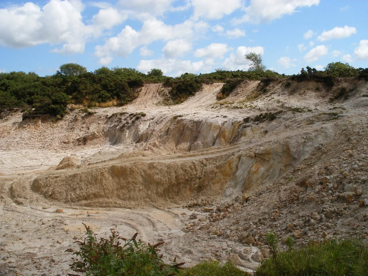 Picture of the Main Opencast at the Hemerdon Ball Mine taken by user of Wikipedia account. The picture is released into Public Domain by the author.