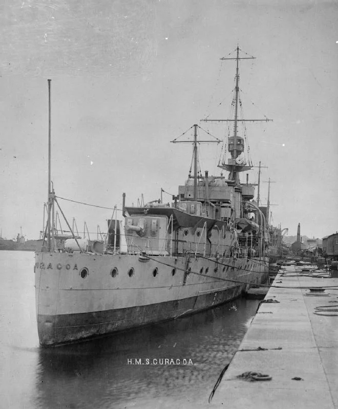 Stern view of British light cruiser HMS Curacoa, showing aft 6-inch gun.