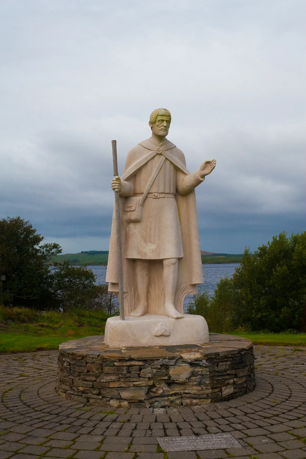 Lough Derg, County Donegal, Ireland
Statue titled St. Patrick The Pilgrim by the Cork sculptor Ken Thompson, unveiled by Brian Keenan on 7 June 2002 and blessed by the Bishop of Clogher, Most Rev Joseph Duffy. The statue is located close to the mainland pier of the ferries to Station Island.