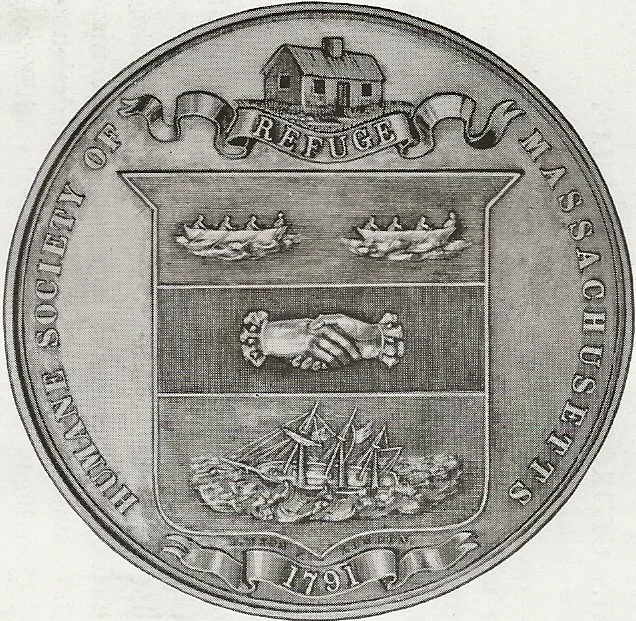 The Silver Lifesaving Medal of the Massachusetts Humane Society issued 1884. After 1849, it was the custom of the Humane Society to present their new Silver Medal, as the equivalent of the Gold Medal of former times, when the resurer showed uncommon courage and perseverance in saving human life at the risk of hiw own. The Massachusetts Humane Society became the model for the United States Life-Saving Service funded by Congress in 1848 and operated by the United States Coast Guard since 1915.