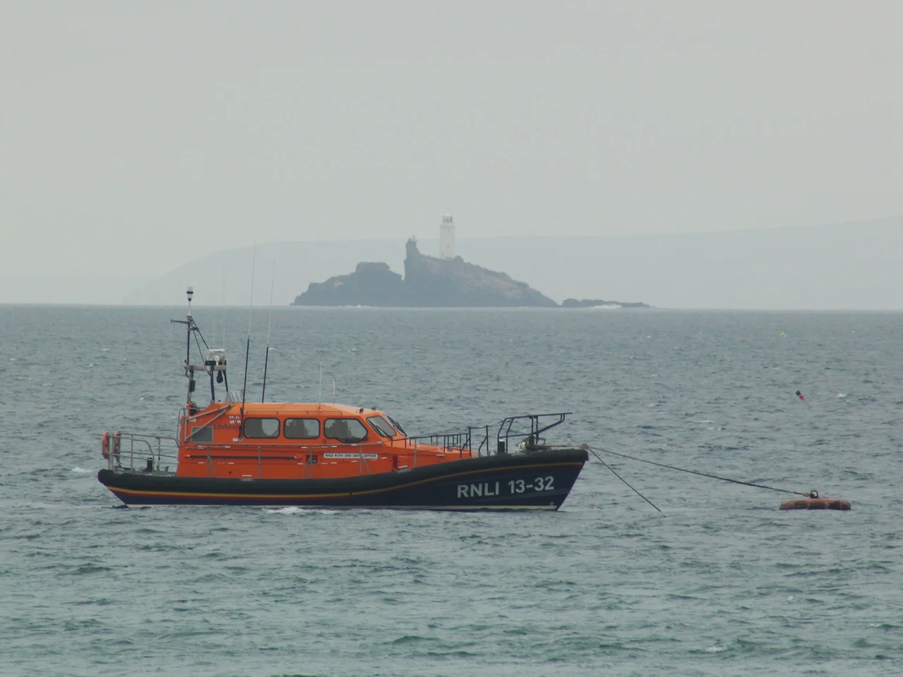 Relief lifeboat Ruth and David Arthur moored off St Ives. Godrevey Island is in the background.