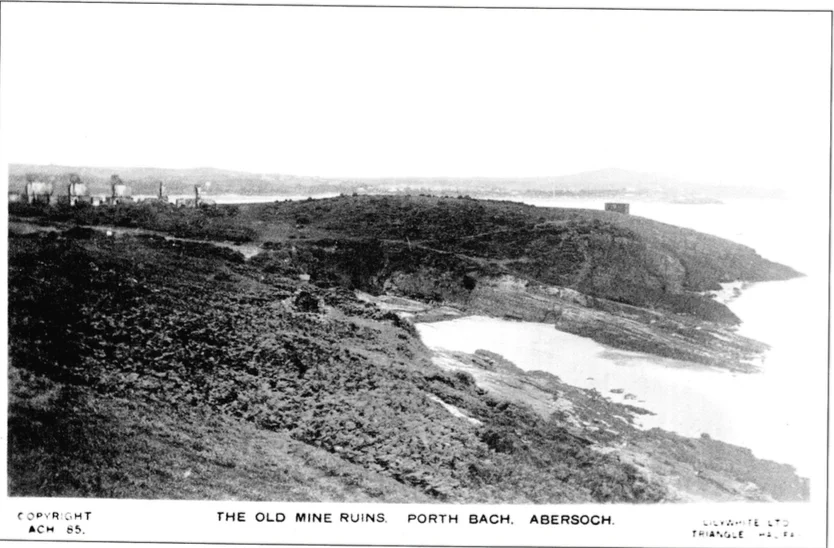 A postcard dated 1930 of Porth Bach and Penrhyn du headland.