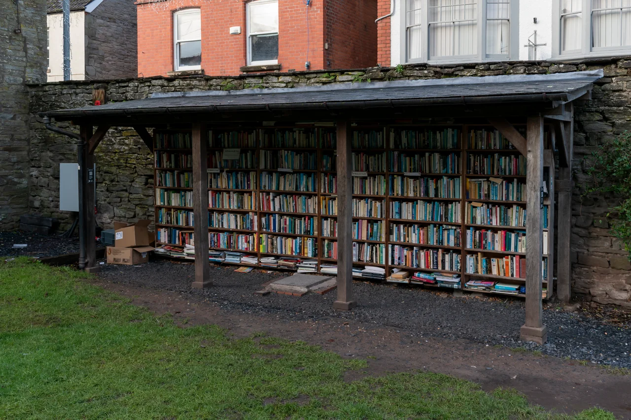 Honesty bookshop in the grounds of Hay Castle, Hay-on-Wye, Wales in December 2022