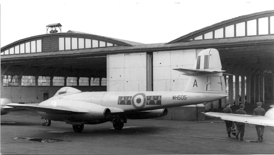 Belfast Truss hangars at RAF Hooton Park, Cheshire, England in September 1952. The aircraft is Gloster Meteor F8 WH505 'A' of RAF 611 Squadron.