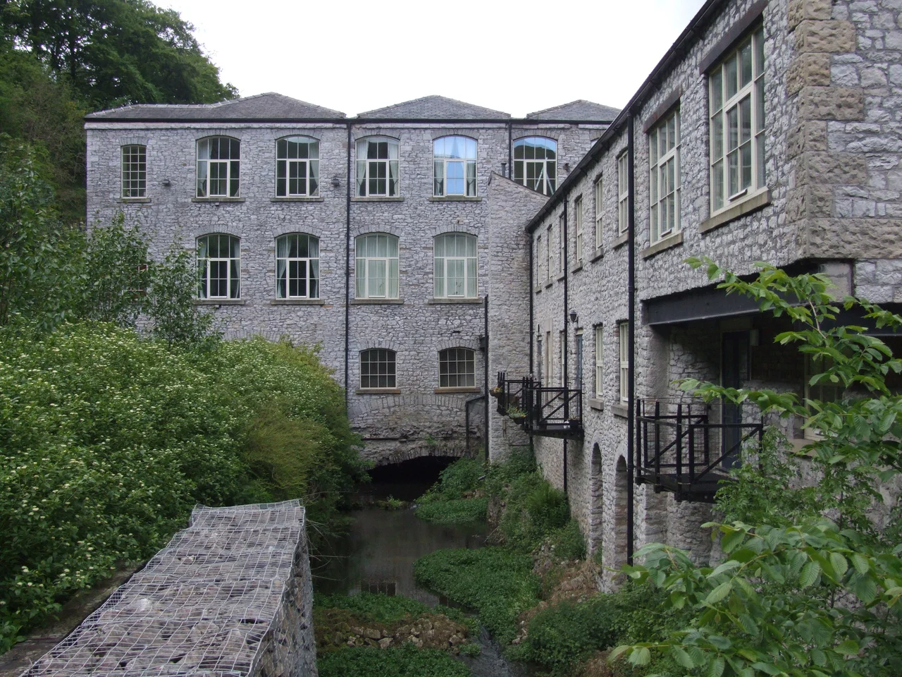 Litton Mill is a small hamlet built round a former cotton mill, in Millers Dale, on the River Wye near
Bakewell in the Derbyshire Peak District in the United Kingdom.
The mill from downstream showing the tail race.
Camera location53° 15′ 12.24″ N, 1° 45′ 34.92″ W View this and other nearby images on: OpenStreetMap 53.253400; -1.759700
