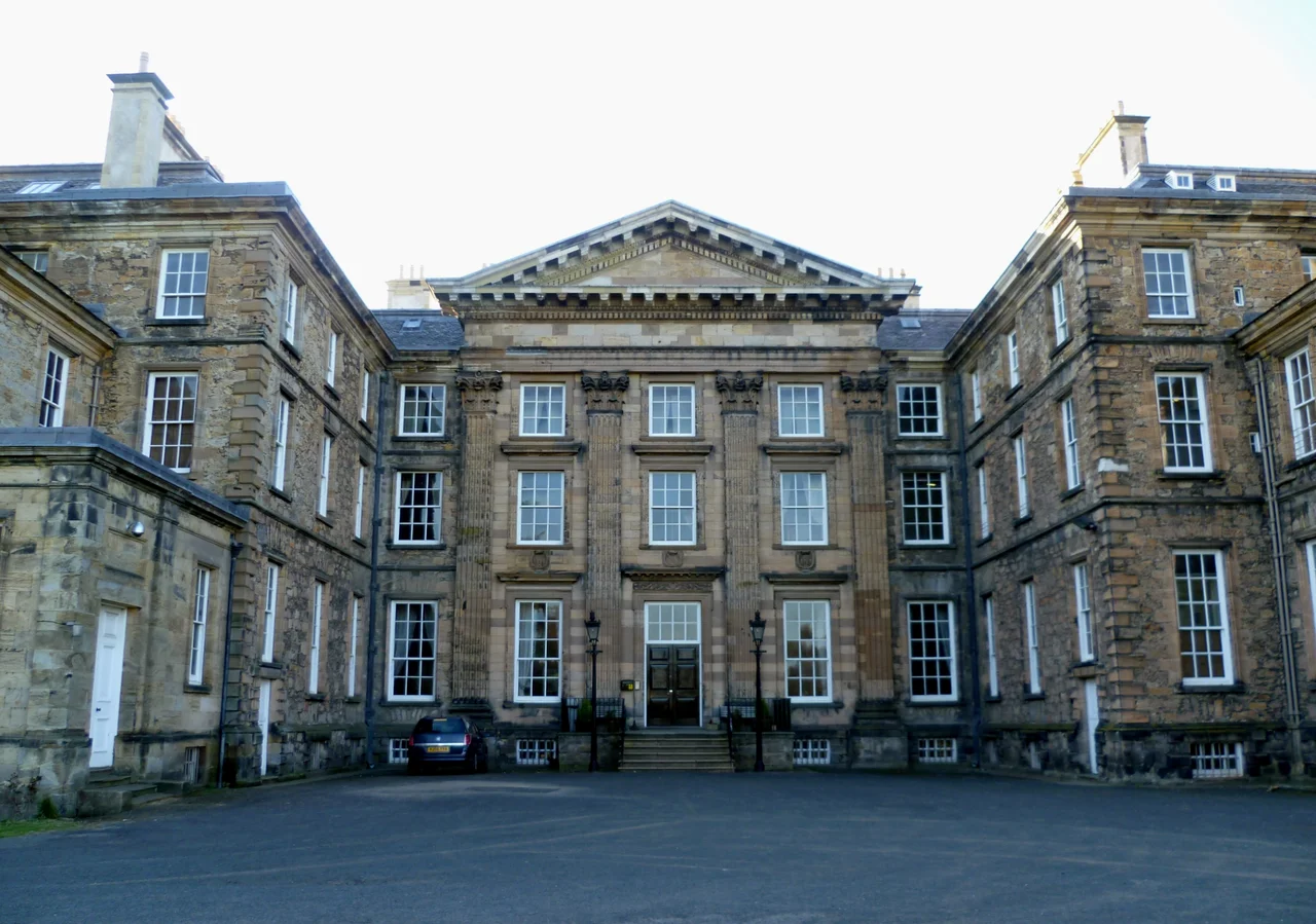 Frontage of Dalkeith Palace, now styling itself more modestly as Dalkeith House. The building is the work of several architects including additions by Vanbrugh. The main portion was built between 1702 and 1711. It is now the Scottish Campus of the University of Wisconsin
