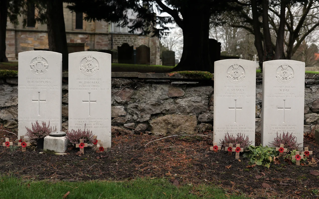 The four graves containing the remains of the four privates from the Pioneer Corps who died at Catterick Bridge railway station in an explosion on 4 February 1944