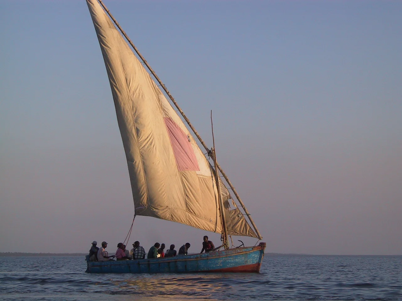 Dhow ferrying passengers from Inhambane to Maxixe in Mozambique. It is using a lateen sail, with the lateen sail currently in the "bad tack" (with the sail pressed against the mast.) Copyright © 2006 by Steven G. Johnson and donated to Wikipedia under the GFDL.