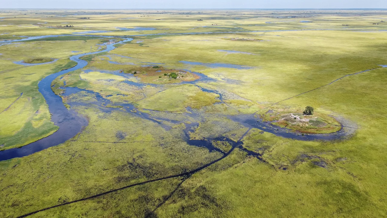 isolated human settlements on high ground in the Barotse Floodplain near Mongu city aerial view