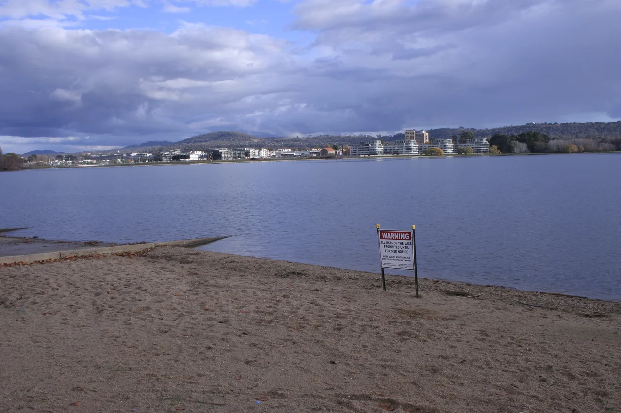 Lake Burley Griffin, East Basin. With sign "Warning - All uses of the lake prohibited until further notice - Water quality monitoring has detected high levels of Algae"