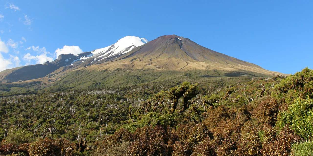 Mount Taranaki (left) & Fanthams Peak from Dive Lake. Egmont National Park, New Zealand