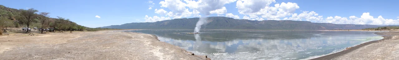 Panoramic view of Lake Bogoria: the Loburu delta with proximal hot springs and hot spring marshes. Owen et al. 2004, p. 61, show the same view. Owen, Hover & Ashley 2004, p. 63, show the location of the Loburu delta (on the west edge of the lake, toward the middle length).