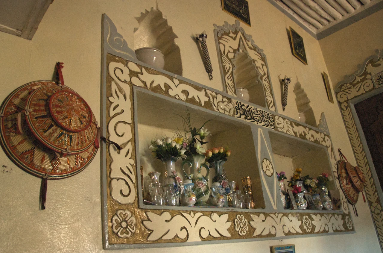 Traditional Harari homes have lots of niches, and they're full of interesting things. I was fascinating by this collection.
Harar, Ethiopia.