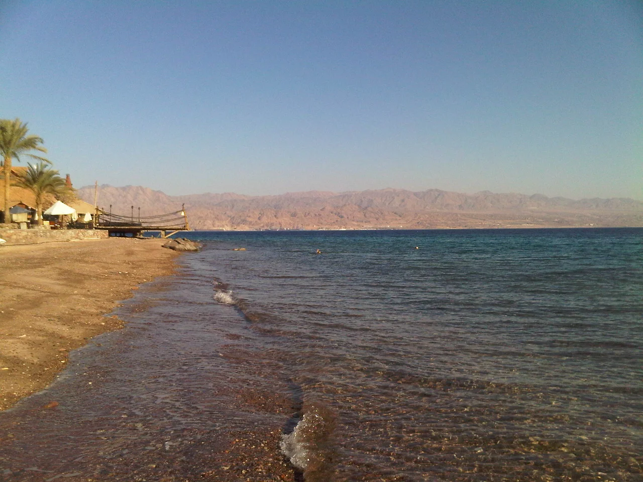 Red Sea stony beach in Taba, Egypt (viev of the Gulf of Aqaba waters).