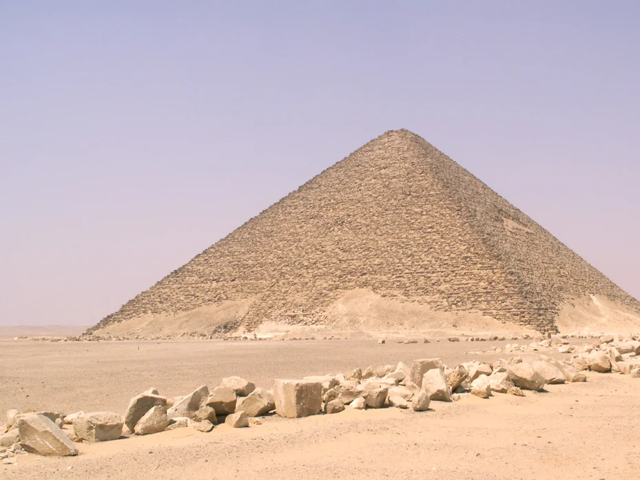 Snofru's Red Pyramid
This area is arguably the most important pyramid field in Egypt outside Giza and Saggara, although until 1996 the site was inaccessible due to its location within a military base,and hence was virtually unknown outside archaeological circles.
The southern pyramid of sneferu, commonly known as the Bent pyramid, is believed to be the first (or by some accounts, second) attempt at creating a pyramid with smooth sides. In this it was only a partial - but nonetheless visually arresting - success; it remains the only Egyptian pyramid to retain a significant proportion of its original limestone.