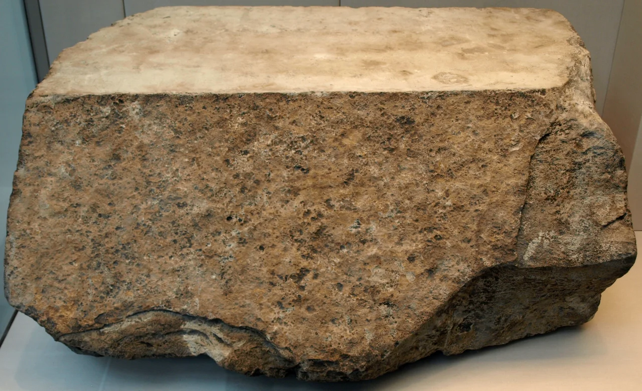 One of the original casing stones for the Great Pyramid (circa 2570 BC), most of which were removed during medieval times. This block was found in the rubble surrounding the pyramid. EA 490.
