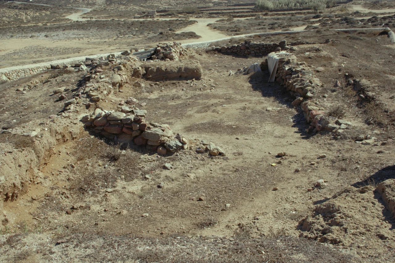 Pitiful remnants of the Early Cycladic settlement from the Early Bronze Age or end of Neolithic. Ftelia on Mykonos.