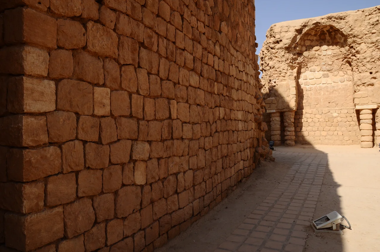 The picture shows the front and main entrance of Sarvestan Palace. After entering, a visitor arrived the main hall, the big dome is ceiling of the main hall. View is from South-West.