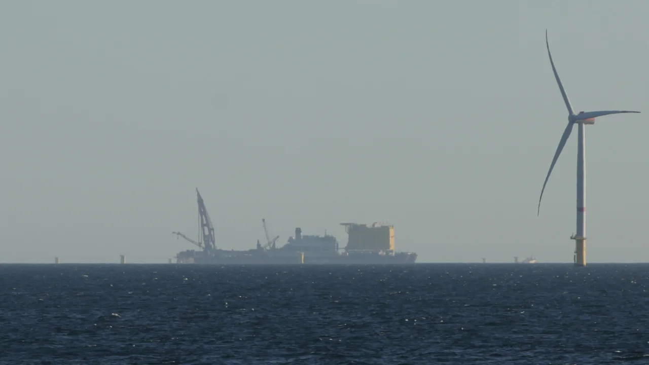 The crane ship Pioneering Spirit delivering the converter platform BorWin Epsilon to windfarm He Dreiht