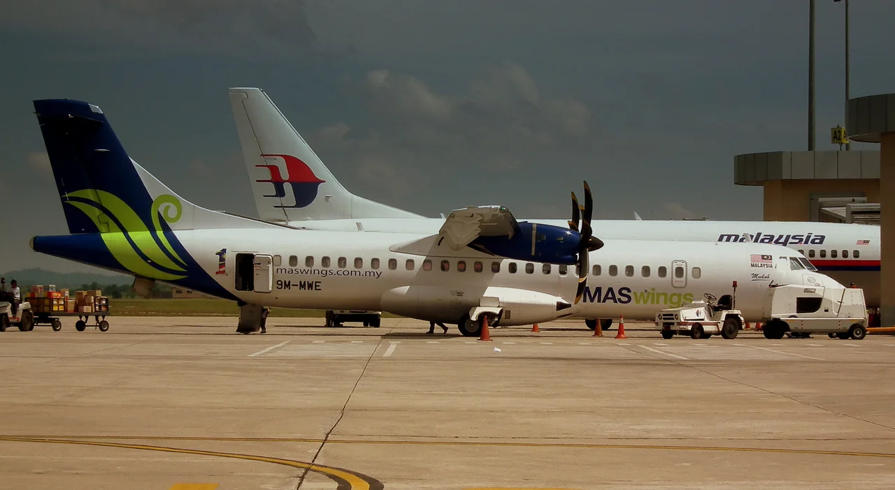 MAS WINGS ATR72 9M-MWE AT MIRI AIRPORT SARAWAK ISLAND OF BORNEO JUNE 2011