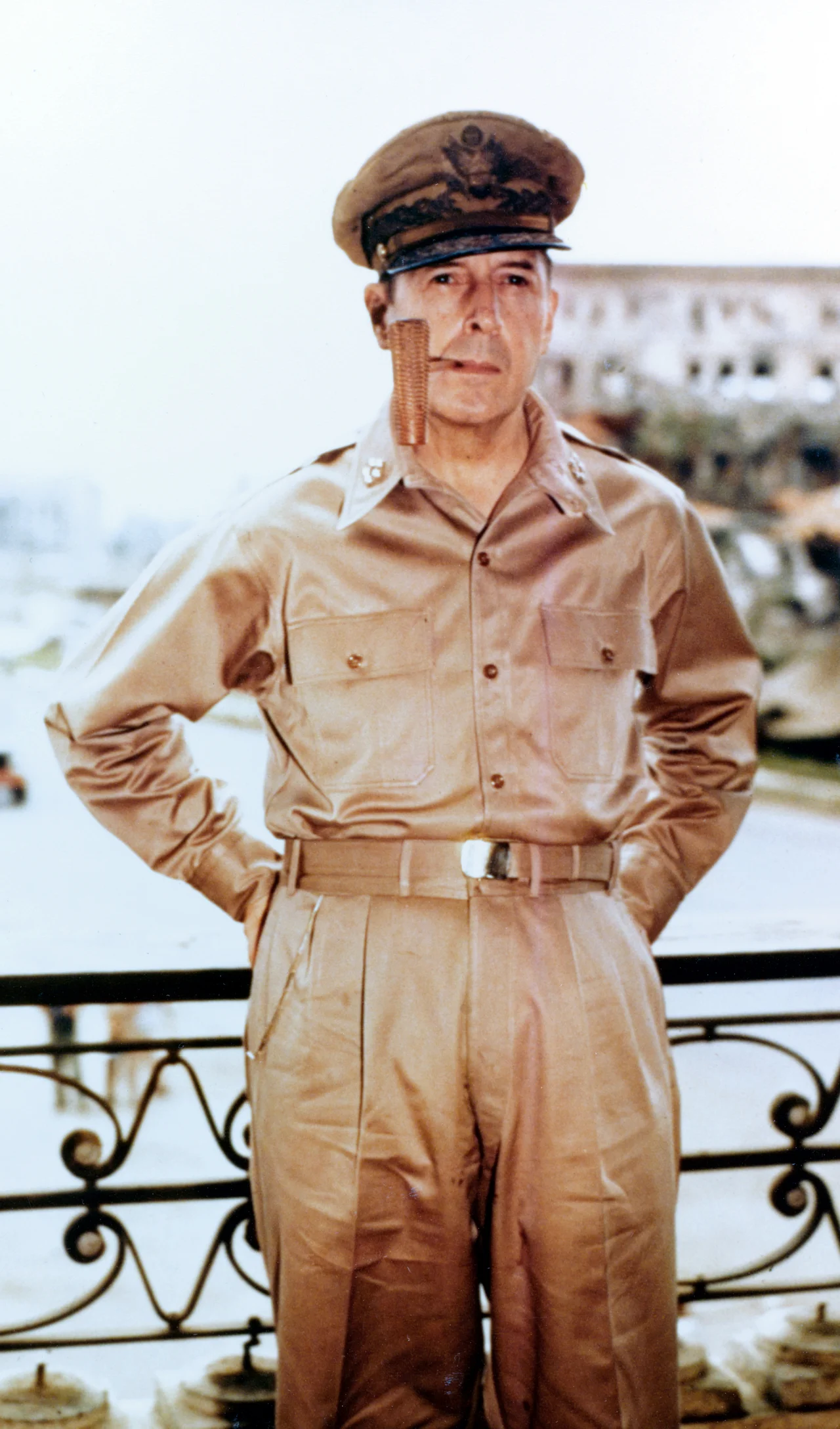 General of the Army Douglas MacArthur smoking his corncob pipe, probably at Manila, Philippine Islands, 2 August 1945.