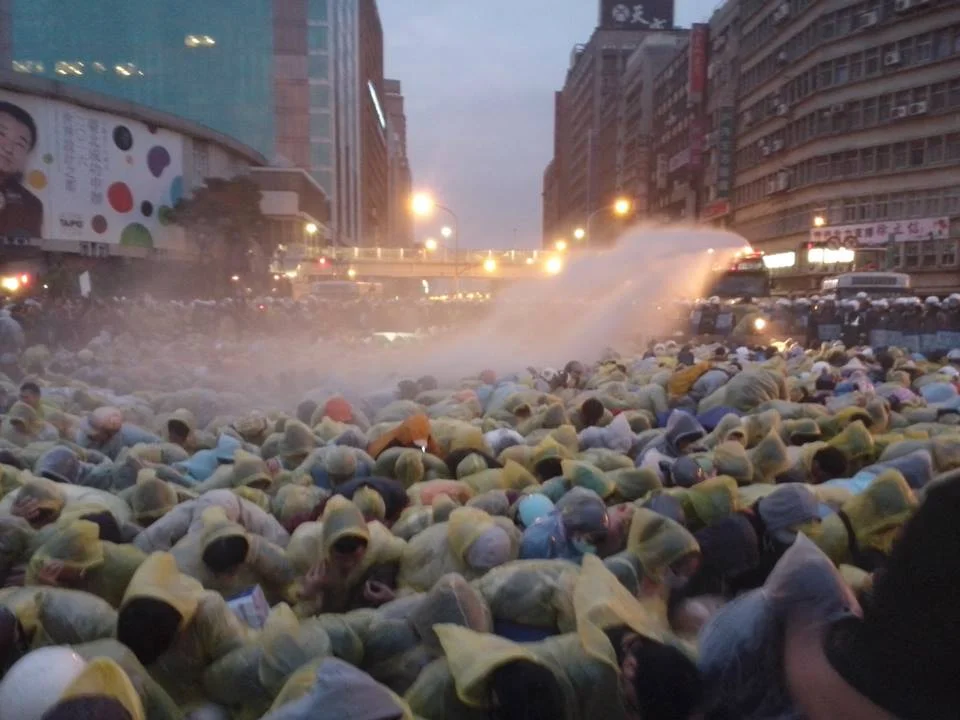 Anti-nuclear protesters sprayed by water cannons in Taipei, Taiwan on April 28, 2014